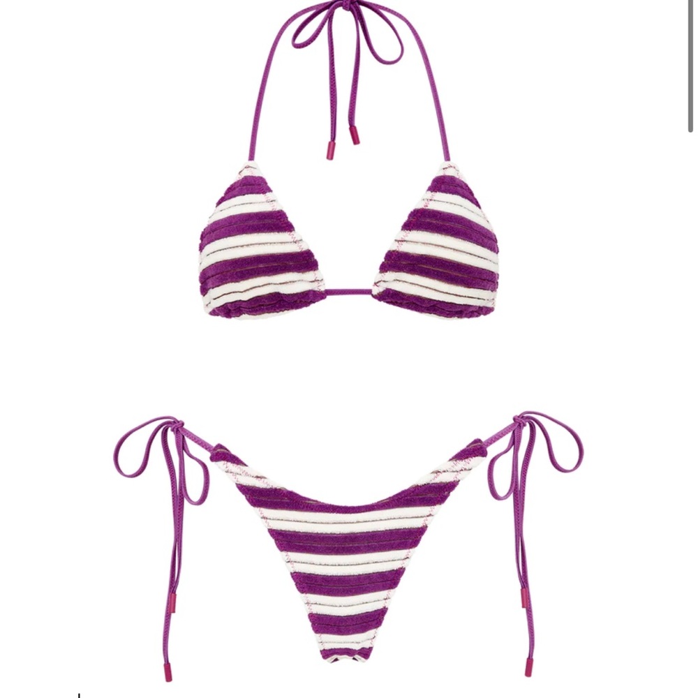 Triangl bikini. Never worn- New with tags. XS top and Small bottom